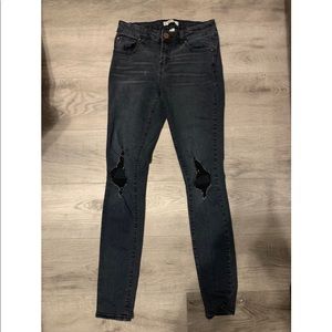 Black faded skinny jeans